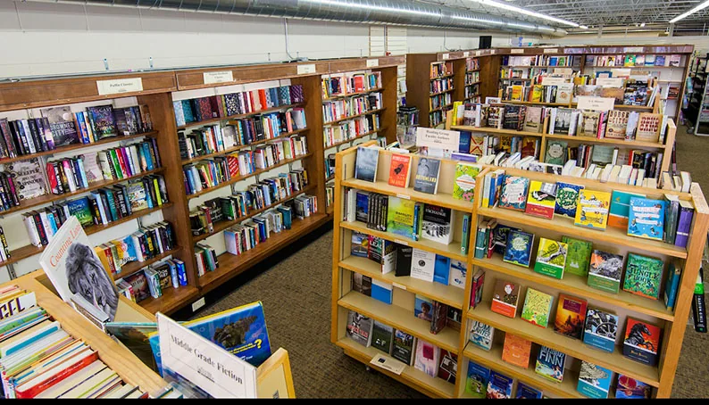 Elevated photo looking down on the book area of the sales floor.